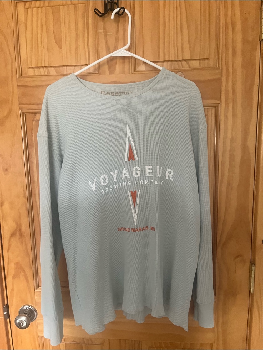 Reserved light blue waffle knit long sleeve top with tan logo